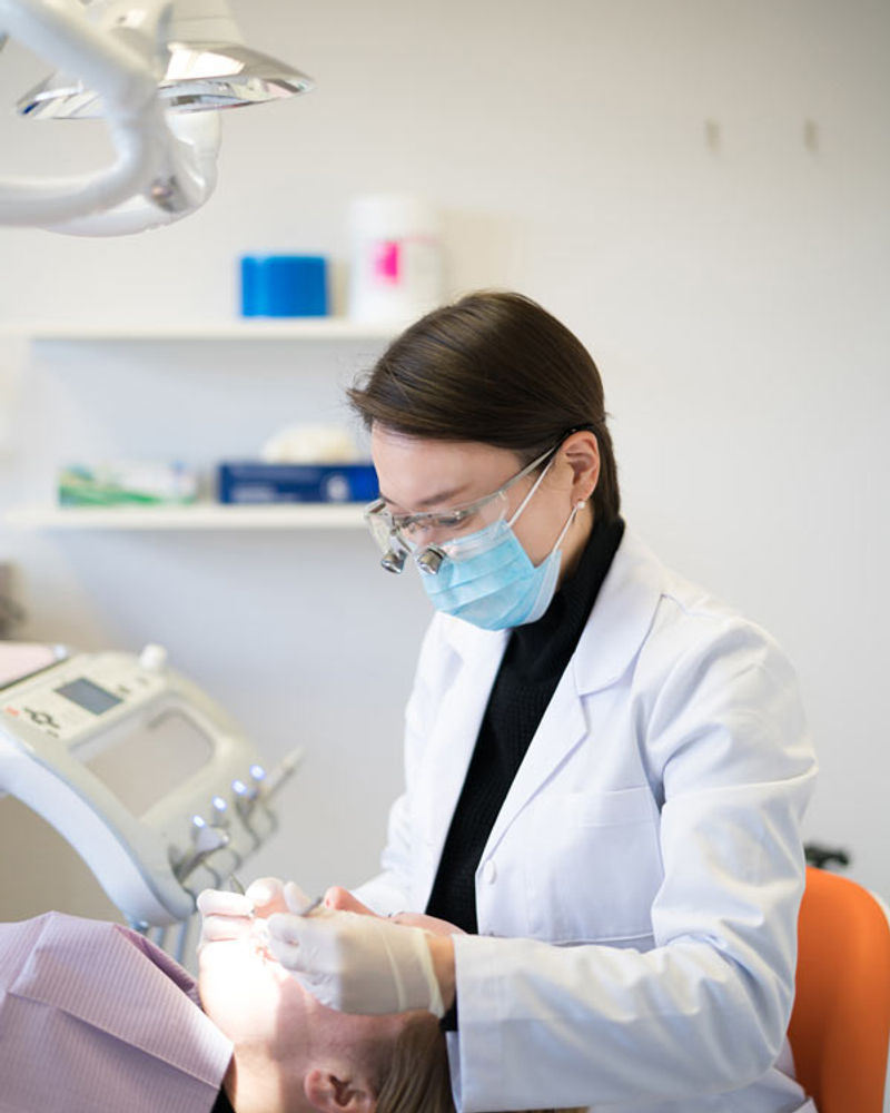 Dr. Catherine Pyo providing care at Easy Dental